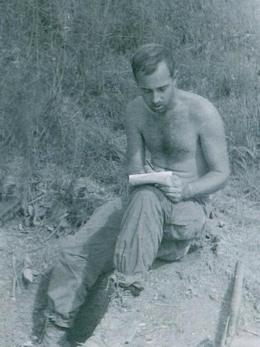 Derl Horn writing a letter home from Vietnam