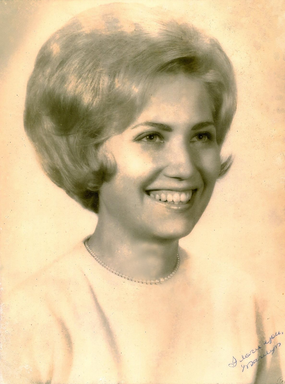 Studio portrait of Marilyn, inscribed "I love you, Marilyn"
