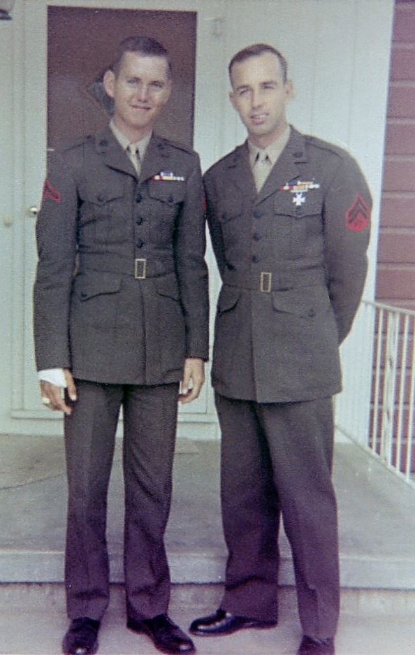 Two Marines in dress uniform